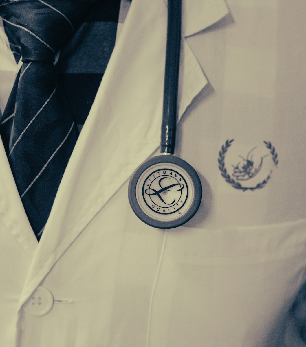 a doctor's coat with a stethoscope attached to it symbolizing those who need professional liability insurance the most